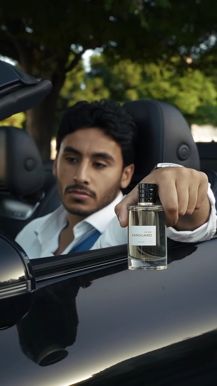 Vanguard perfume lifestyle video featuring a male model presenting a fragrance bottle from a black luxury convertible.